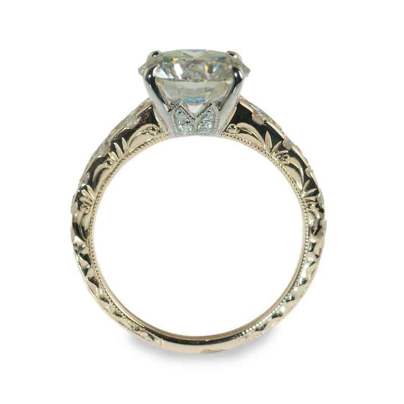 Tapered hand engraved solitaire engagement ring