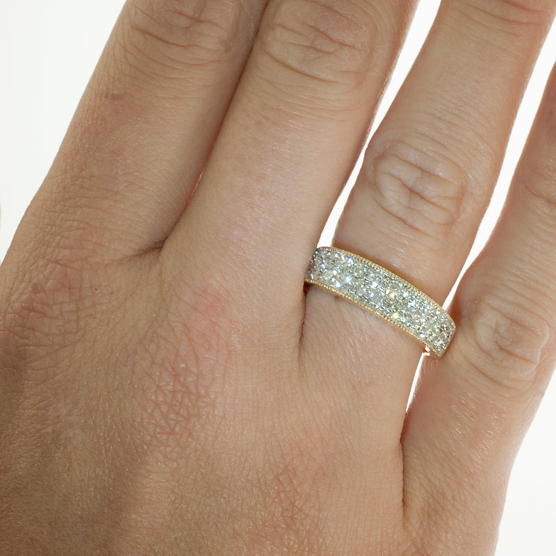 Tapered pave diamond two tone band ring