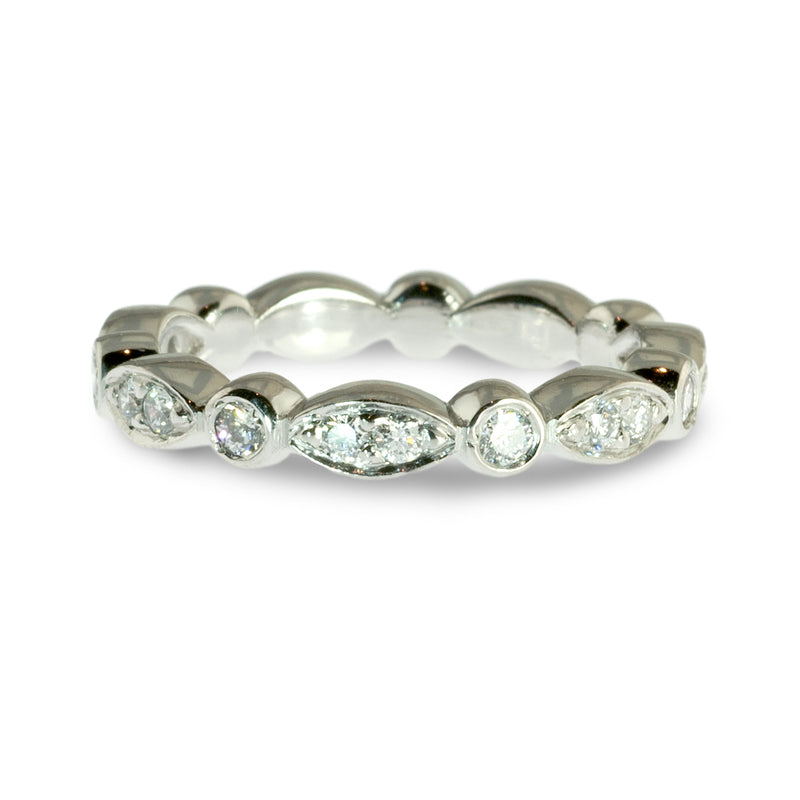 Marquise shaped and round bezel diamond wedding ring