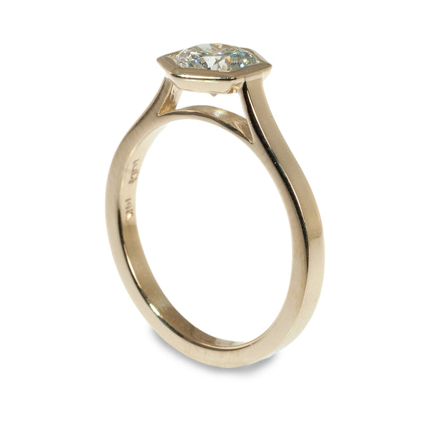 Hexagonal bezel set diamond engagement ring