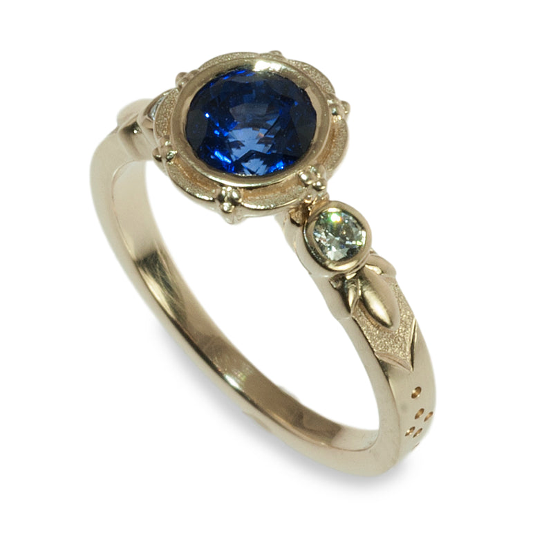 Sapphire bezel set flower petal ring