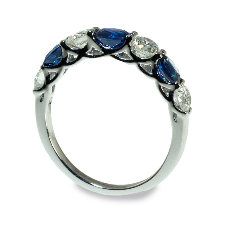 Oval sapphire and diamond band ring