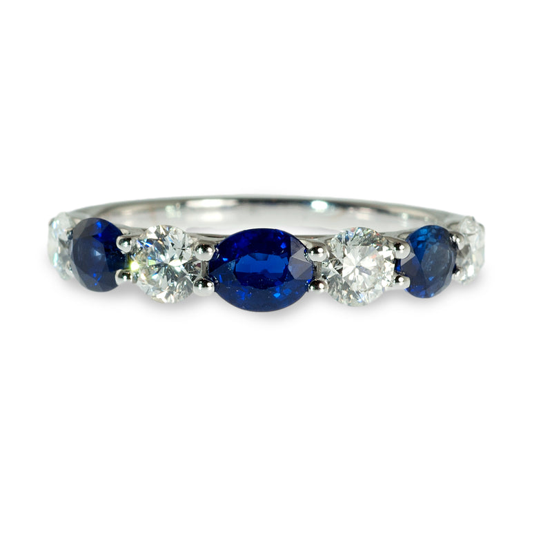 Oval sapphire and diamond band ring