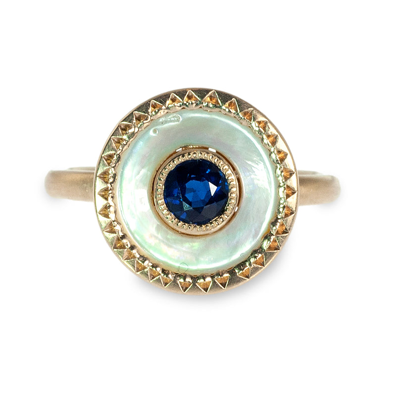 Button ring with sapphire center