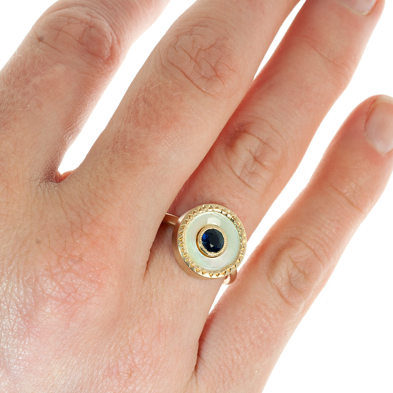 Button ring with sapphire center