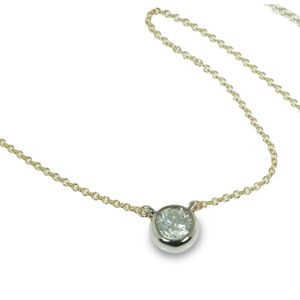 Two-tone bezel set diamond pendant