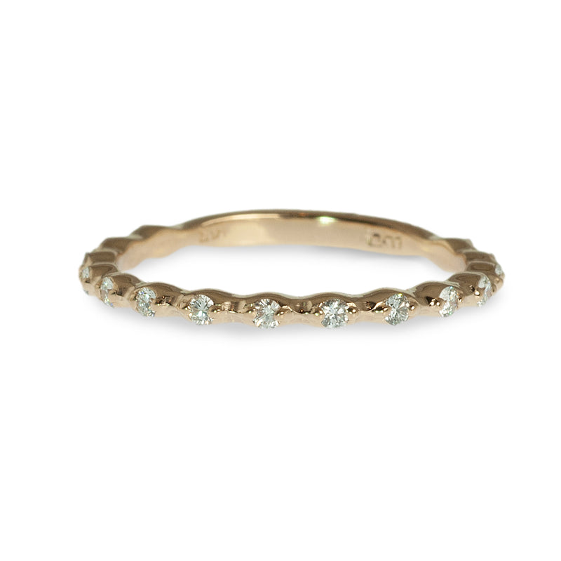 Delicate spaced diamond band